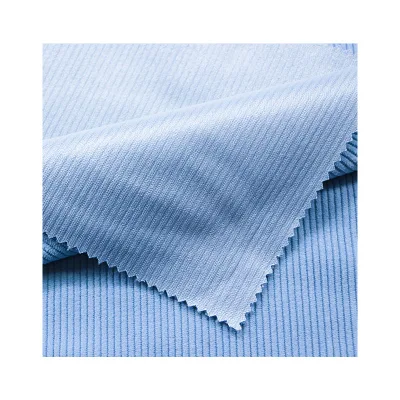 Tela de pana azul hielo agradable a la piel 100% tela de franela de poliéster para pantalones causales